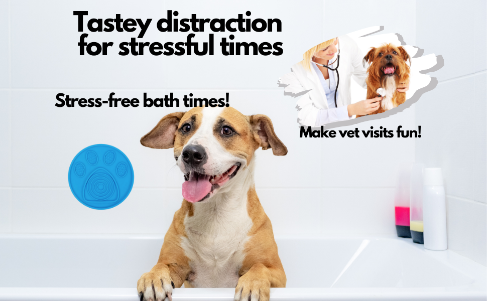 Picture shows dog enjoying bath time and vet visit with lick mat